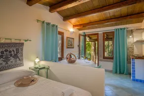 Monolocale estilo sardo con jardín, terraza y piscina compartida - Image 5