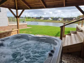 2-Bed Lodge Sleeps 5 w Hot Tub & Lake View - Image 3