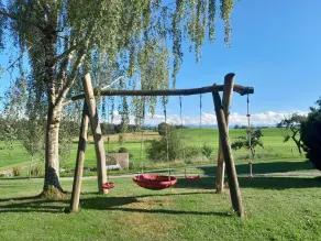 Farmhouse vacation rental in the beautiful Allgäu region, featuring a lawn for sunbathing and a barbecue area - Image 3