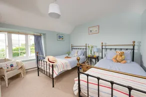 A cosy cottage with a woodburner - Image 3