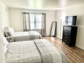 Comfy, Clean & Spacious w/2 TVs, parking, laundry  - Image 4
