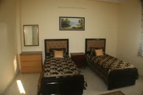3 BHK Beautifully Furnished Apartment with Kitchen and attached Bath rooms. - Image 2