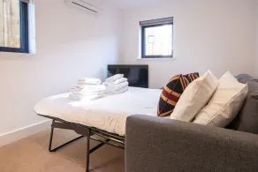 A contemporary glass fronted lake side home that sleeps 8 guests  in 4 bedrooms - Image 5