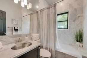 Experience “The Oak at Landmark,” a refined 1BR/1BA retreat on Dallas’s prestigious Swiss Avenue. Enjoy a private patio, marble-finished bath, high-speed Wi-Fi, and smart TV in a serene setting that blends historic charm with modern comfort. - Image 4