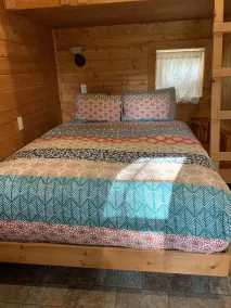 Glamping at its finest in an adorable tiny home cabin that sleeps up to three! Shared hot tub. Beautiful property surrounding the cabin. Short stroll to Copper Creek. Walking distance to Copper Creek Restaurant. 2 miles to Mt Rainier National Park. - Image 5