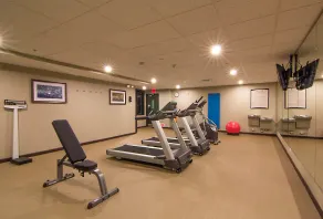 Suite 4-Mins from Airport | Fitness Center + Pool - Image 3