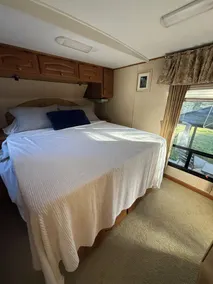 Waterview Trailer on Georgian Bay w/ kayaks and paddleboard and sandy beach - Image 3