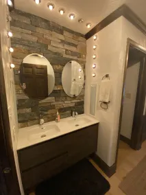 The eclectic lodge sits on 10 acres and is within 40 minutes from 3 ski resorts. - Image 5