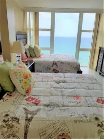 Une chambre sur la plage avec une impressionnante vue sur l'océan - Image 4