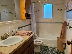 Cheerful two-story,  4-bedroom family home.  Whole house HVAC system! - Image 2