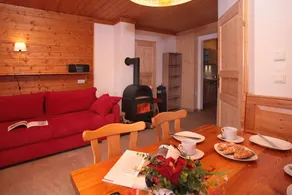 Staudi's ski hut vacation apartment Top1 in hut style directly on the slopes Stove - Image 5