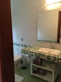 House in a gated community, surrounded by lush nature and rivers for swimming. - Image 2
