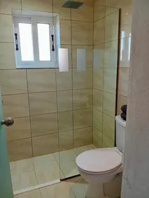 Charming Villa with Garden, 10-Min Walk to St. George Beach, Close to Amenities - Image 3