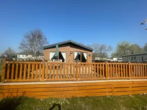 luxury lakeside lodge with a sunken hot tub on bull rush a peaceful feature lake @Tattershall lakes - Image 4