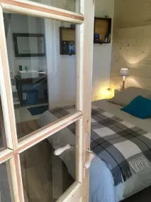 Appartement Cosy Avec Petit Jardin et Parking - Image 4