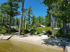 Adorable cottage set among tall pines with sandy beach -only .5  mile from town. - Image 4