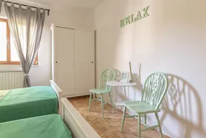 Room with two single beds - Image 5