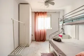 Stylish 2-bedroom apartment with private patio and WiFi in enjoyable Málaga - Image 5