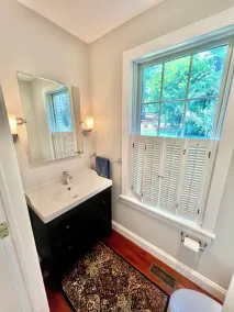 Modern farmhouse located on 53 acres of manicured rolling hills. - Image 3