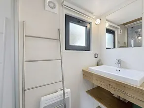 Gemütliche Tiny House: Strandnah, beheizter Pool, Fitness & Spielplatz - Image 5