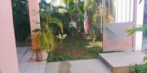 Bonita planta baja con 2 recamaras y un baño, jardín con asador y cochera. - Image 3