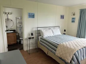 Renovated Cottage with Two Full Bathrooms Steps from PEI's Most Beautiful Beach - Image 2
