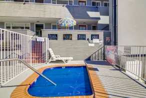 View of the water, steps from the beach, bikes and other toys included. - Image 5