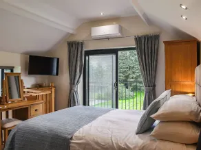 Intimate and inviting, this couples retreat is a cosy haven for two. - Image 5