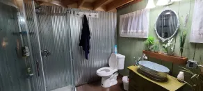 Wood Haven Lodge. Secluded, cozy log cabin in Northern Michigan. - Image 2
