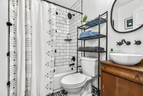 Walk to downtown Holly from this newly renovated historic apartment! - Image 4