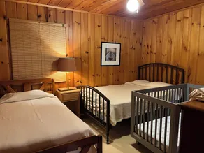 Great fishing & sunset views, lakeside cabins joined by porch.  1 hour from TC - Image 5