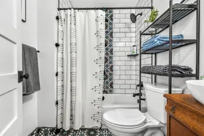 Walk to downtown Holly from this newly renovated historic apartment! - Image 3