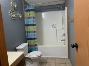 5 bdrm, 3 full bth, large living room and fireplace area.  - Image 3
