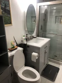 A secluded bedroom with a private full bathroom - Image 2