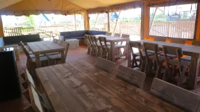 Combined tents with kitchen and bathroom located near a pond - Image 4