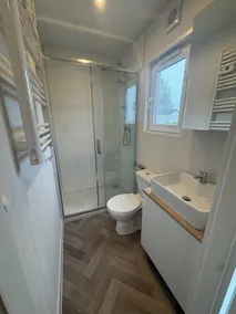 Enjoy a relaxing stay by the water with a private hottub. - Image 2