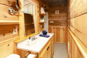 Secluded 1-bedroom lakefront cabin in Lakeside, OR. Ideal for writers or couples seeking solitude. Features a King bed, wood stove, kayak for 2, and stargazing from your private dock. - Image 4