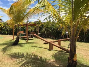 Gated community of houses surrounded by lush greenery, close to Vila and Praia do Lorde. - Image 3