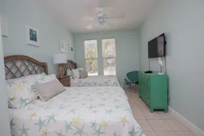 Nice and cozy home is just a short walk to the beach and pool! - Image 5