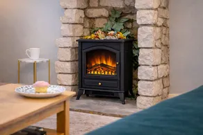Escape to our charming stone cottage in South Wales, a rustic retreat perfect for couples. Enjoy a cozy stay with a stone fireplace, a king-sized bed, and a private, enclosed garden perfect for pets. Conveniently located near Bridgend and  Porthcawl. - Image 2