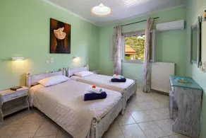 Loggos Haven: Chrisoula's upper-floor escape. Modern comforts, short walk to beaches. - Image 4