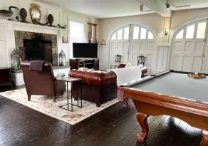 Enjoy our 3-story, family-friendly Carriage House Fireplace and outdoor fire pit - Image 2