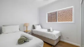 Experience the perfect blend of beachside charm and stylish holiday living - Image 5