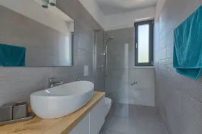 Modern peaceful villa with large pool in green surroundings offering privacy - Image 4