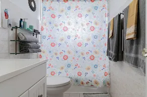 HIDDEN GEM! Spacious 4BR/2B Home W/ Pool and Garage - Image 3