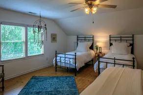 Modern and spacious home surrounded by scenic willow trees. - Image 4