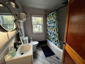 Step into a world where midcentury modern charm embraces Vermont's beauty! - Image 2