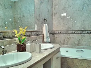 Luxurious 4-suite apartment with gourmet kitchen and large balcony overlooking the sea. - Image 3