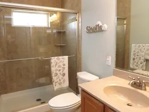 Beautifully furnished, this 6 bedroom, 5 bath house is ready for you to enjoy and just 1.5 blocks to the beach. - Image 3