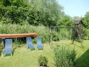 Directly on the dike, a few minutes to the beach, canoeing, trampoline, swing, fireplace - Image 3